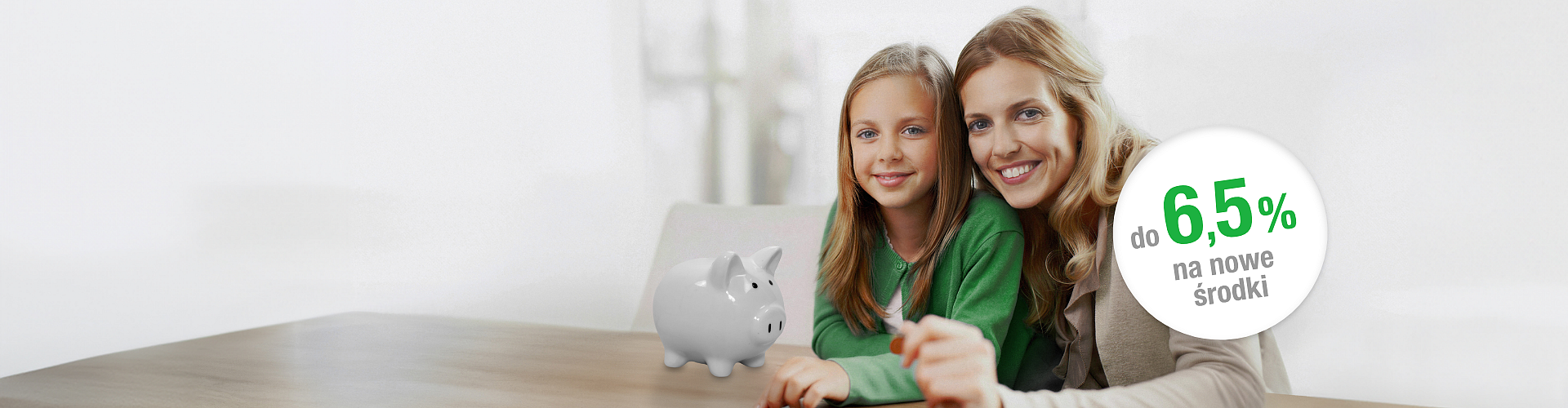 Wizerunek mamy z córką, obok informacja tekstowa "do 6,5% na nowe środki"